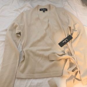 Cream Lulus surplice tie sweater in size S